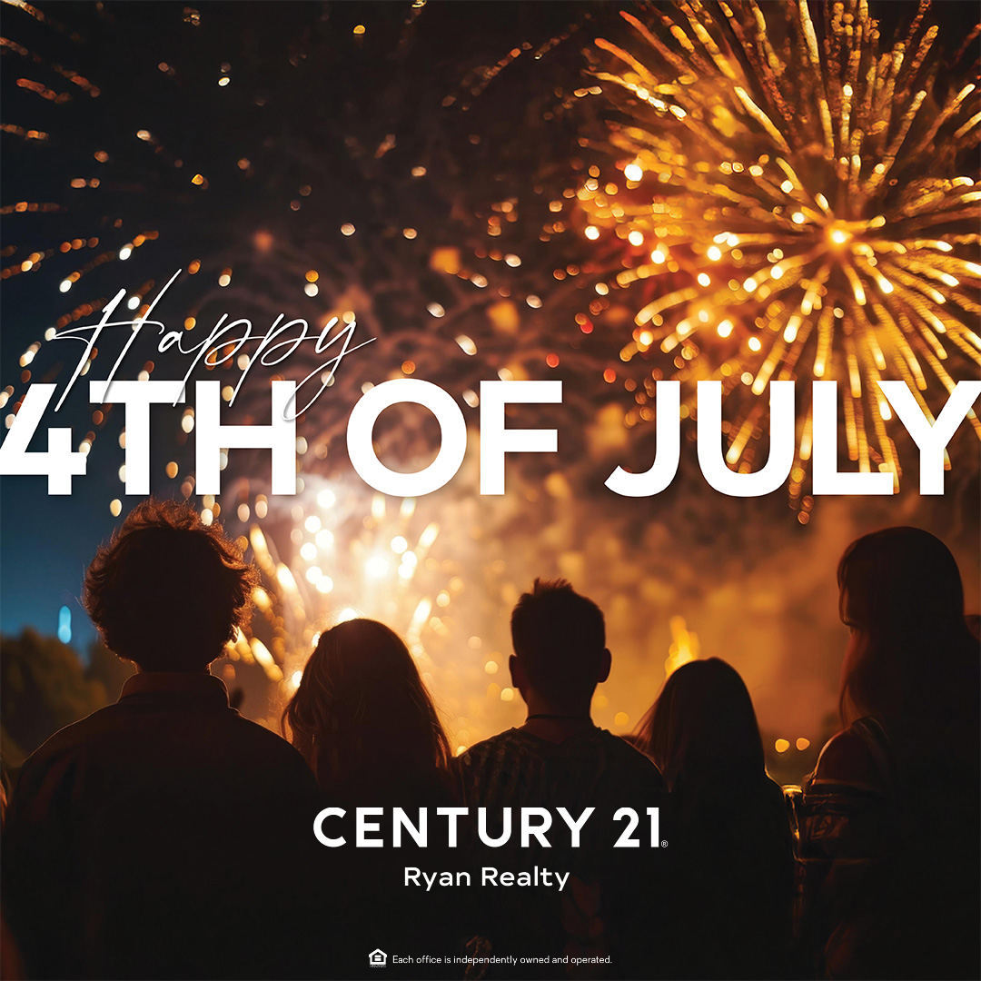 Fireworks light up the night sky over Panama City Beach on the 4th of July, with crowds gathered along the shoreline.